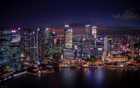 Skyscrapers of night Singapore by the water, Asia