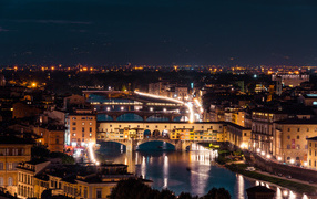 Beautiful night river by the city, Florence. Italy