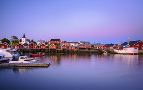 Red stilt houses by the bay, Norway