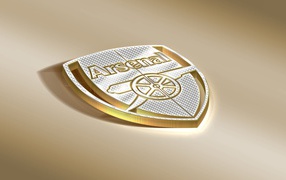 Arsenal football team logo on a brown background