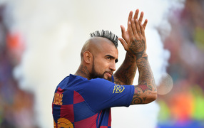 Chilean soccer player Arturo Vidal with tattoos on his body
