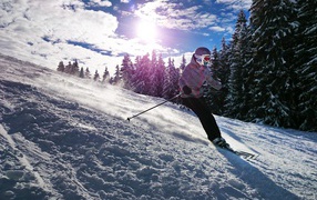 Girl skiing down the mountain