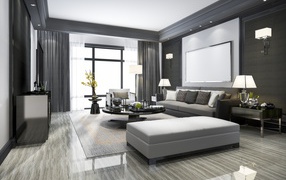 Gray furniture in a living room with a large window.