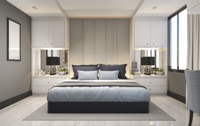 Large double bed in the gray bedroom