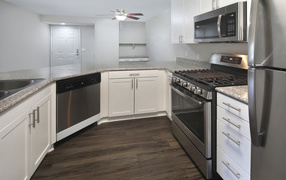 Large gray kitchen with large stove