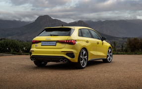2021 Audi S3 Sportback car rear view with mountains in the background