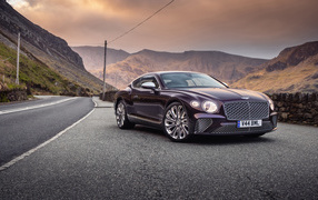 Expensive Bentley Continental GT Mulliner on the track in the mountains