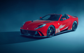 Красный кабриолет Novitec Ferrari 812 GTS N-Largo 2021 года на сером фоне