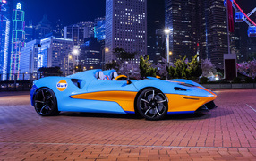 2021 McLaren Elva Gulf Theme car with city background