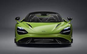 Зеленый McLaren 765LT Spider 2022 года а сером фоне 