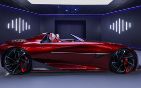 Красный автомобиль MG Cyberster Concept 2021 года вид сбоку