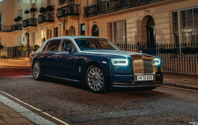 Blue expensive 2021 Rolls-Royce Phantom Extended car in the city