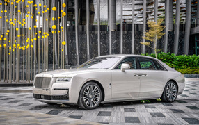 Expensive 2021 Rolls-Royce Ghost EWB in front of the building
