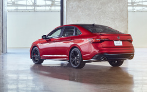 Красный автомобиль Volkswagen Jetta GLI, 2022 года вид сзади