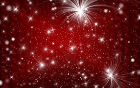 Bright white sparks on red background