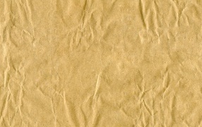 Crumpled yellow paper background