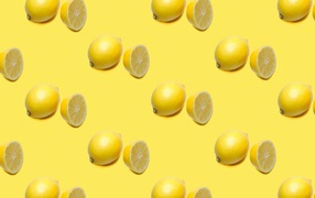 Сочные кислые лимоны на желтом фоне 