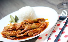 Beef goulash on a plate with rice