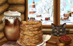 The cat sits at the table with pancakes on Shrovetide