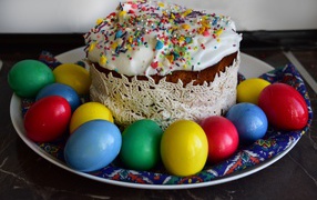 Beautiful Easter cake with painted eggs for the holiday of Easter