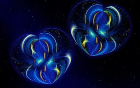 Два красивых неоновых сердца на синем фоне
