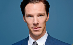 Actor Benedict Cumberbatch face close up on blue background