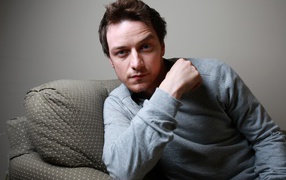 Actor James McAvoy lies on the couch