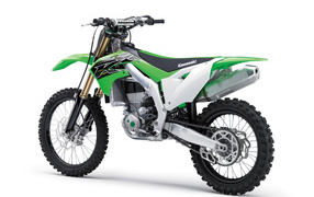 Green motorcycle Kawasaki KX450 on a white background