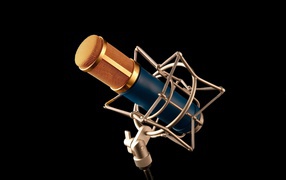 Microphone on a stand on a black background