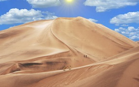 High sand dune under the blue sky