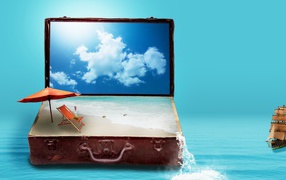 Большой чемодан путешественника с океаном