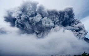 Ash cloud over volcano