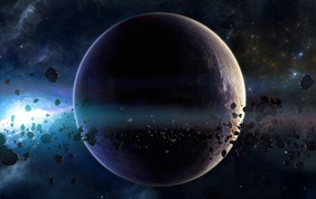 Большая планета с астероидами в космосе
