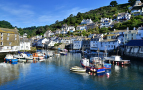 Houses on the pier in the resort town of Polperro, England