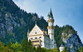Ancient Neuschwanstein castle on a background of mountains, Germany