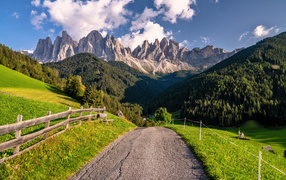 The road leads to the Dolomites, Italy