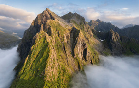 Large high mountains in the fog, Lofoten Islands. Norway