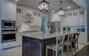 Beautiful bright kitchen with lamps