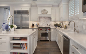 Beautiful white kitchen with a two-compartment refrigerator
