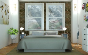 Большая кровать  в комнате с картинами на стенах 