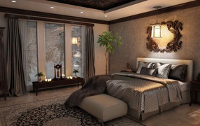 Large bed with gray bedspread on the bed in the bedroom
