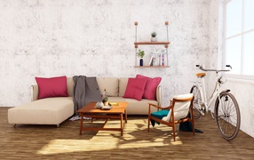 Диван и велосипед стоят в комнате