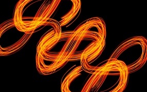 Огненные завитки на черном фоне