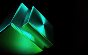Glowing green abstract shapes on black background