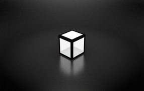 Glowing white cube on a gray background