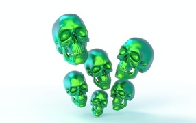 Green steel skulls on white background