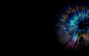 Разноцветная вспышка на черном фоне