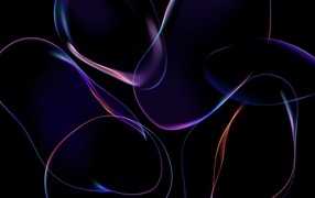 Неоновые мыльные пузыри на черном фоне