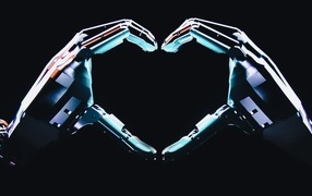 Robot makes a heart with his hands