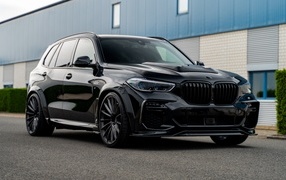 Черный автомобиль Prior-Design PDG5XWB Widebody Aerodynamic Kit